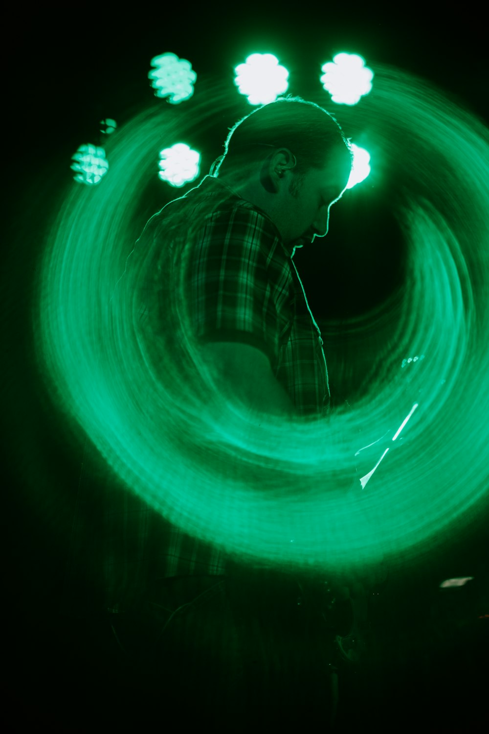 man wearing plaid top