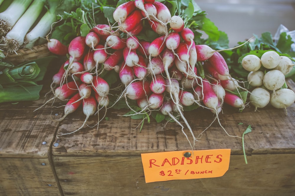 radishes on brown wooden box