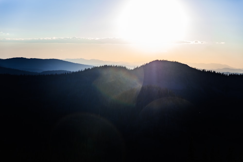 silhouette of mountain during daytime