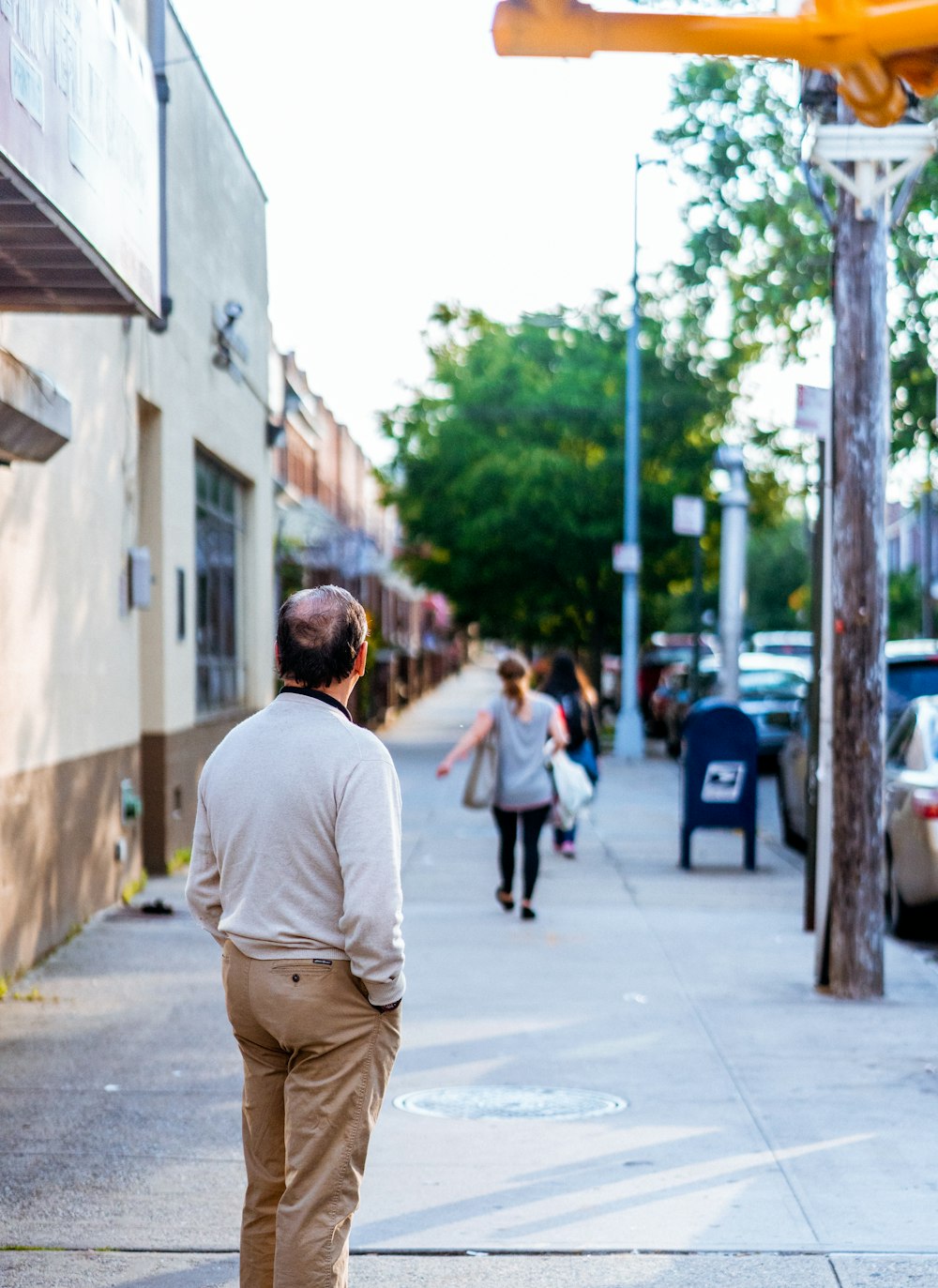 man standing outside looking forward