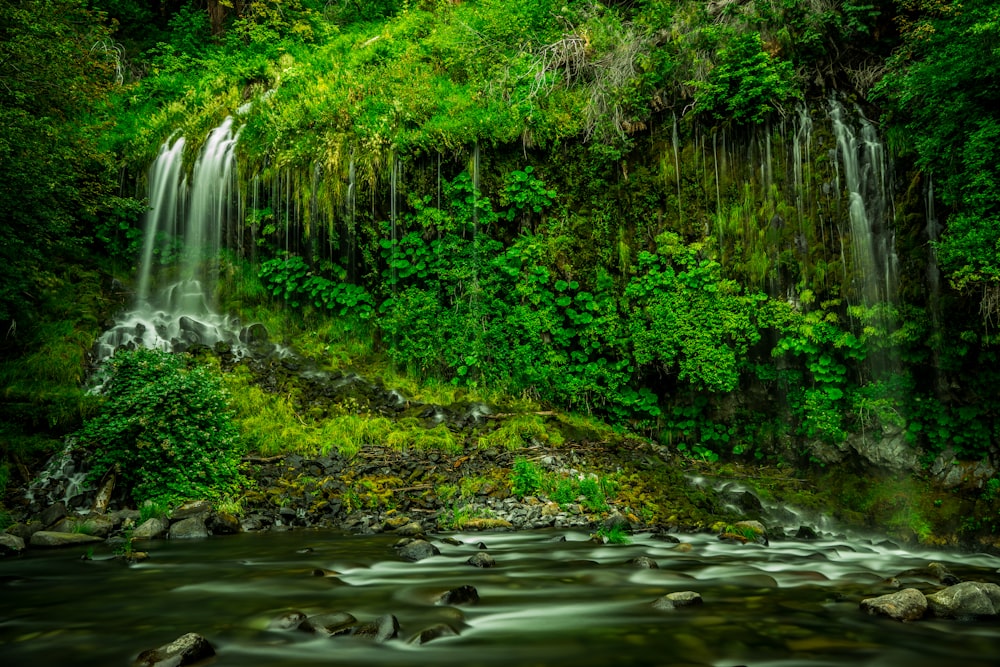 time lapse photography of multi-step waterfalls