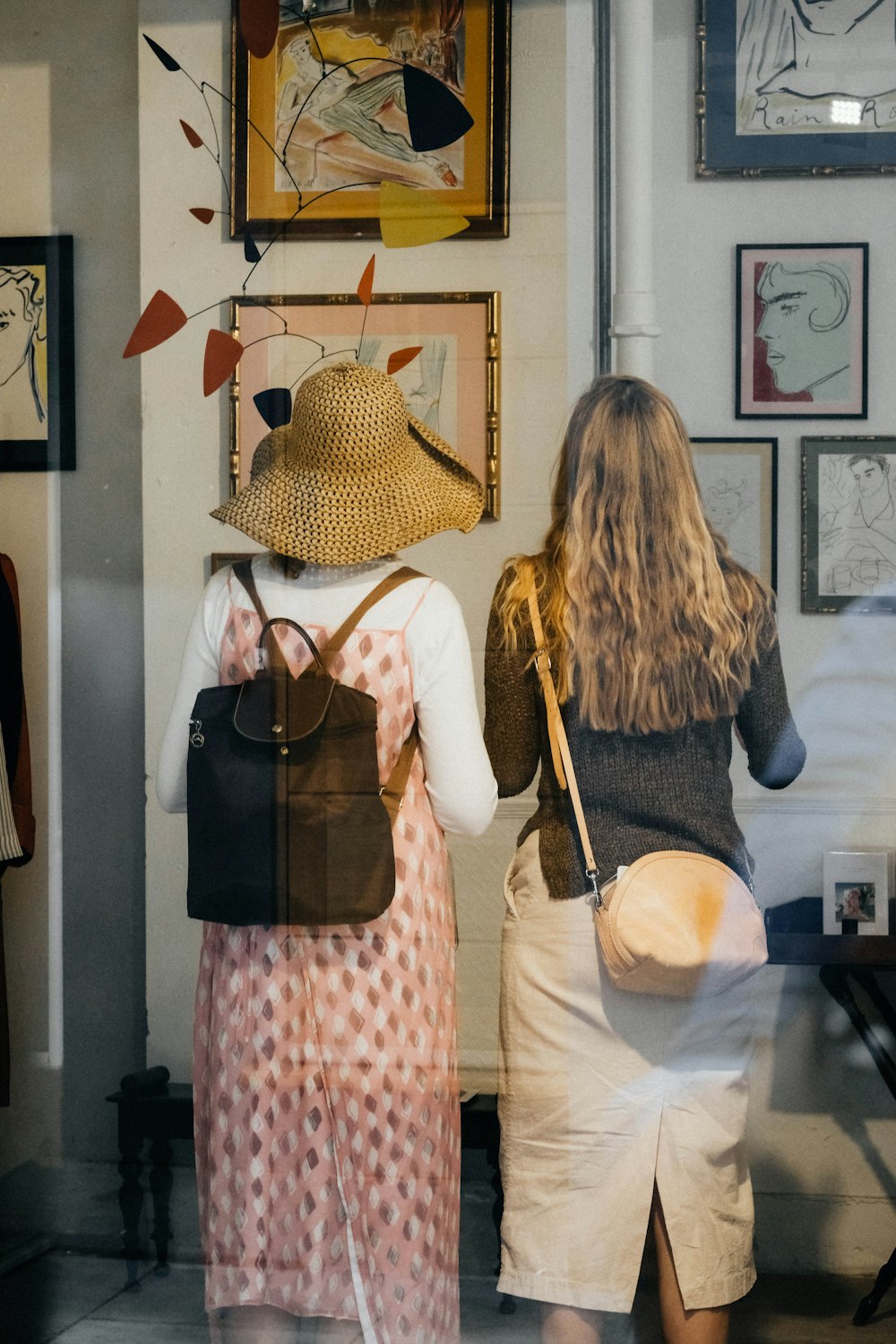 a couple of women standing next to each other