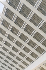 the ceiling of a building with many rows of windows