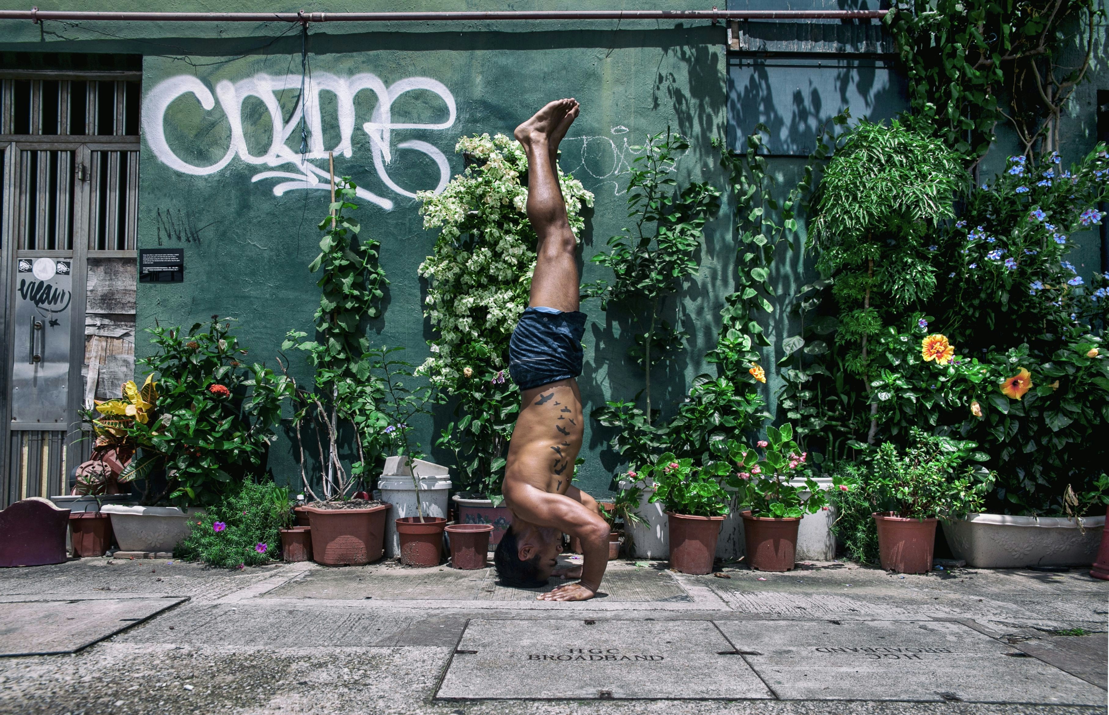 man doing upside down exercise