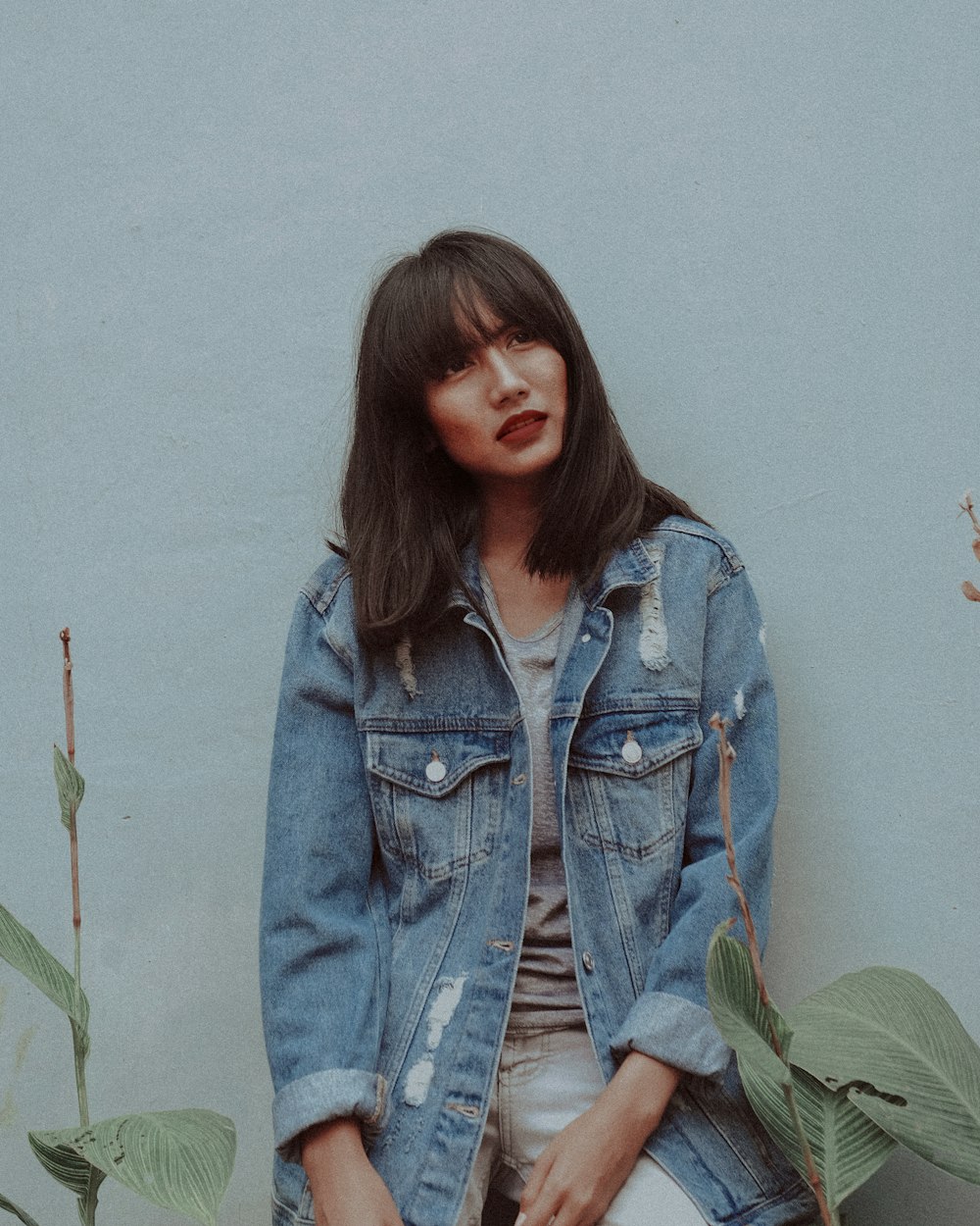 woman with blue denim jacket