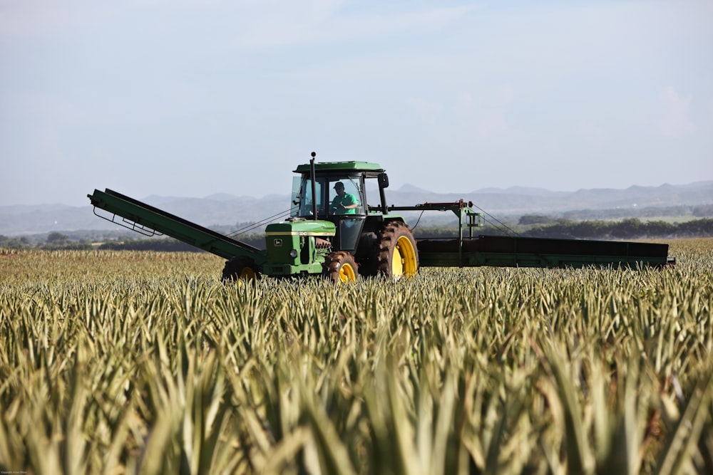 person riding tractor