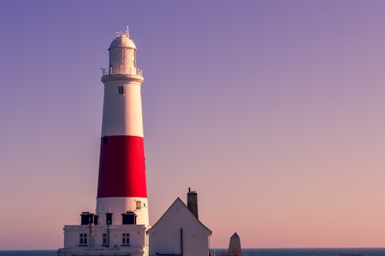 white and red lighthouse in Portland Bill Lighthouse United Kingdom