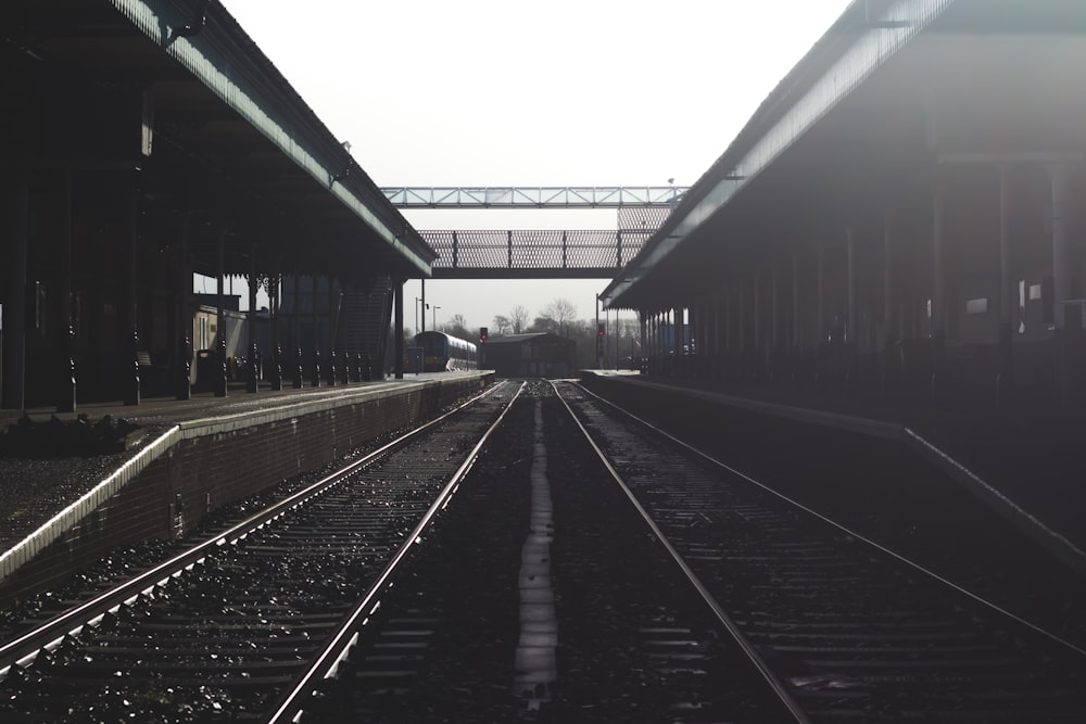 black metal train railways