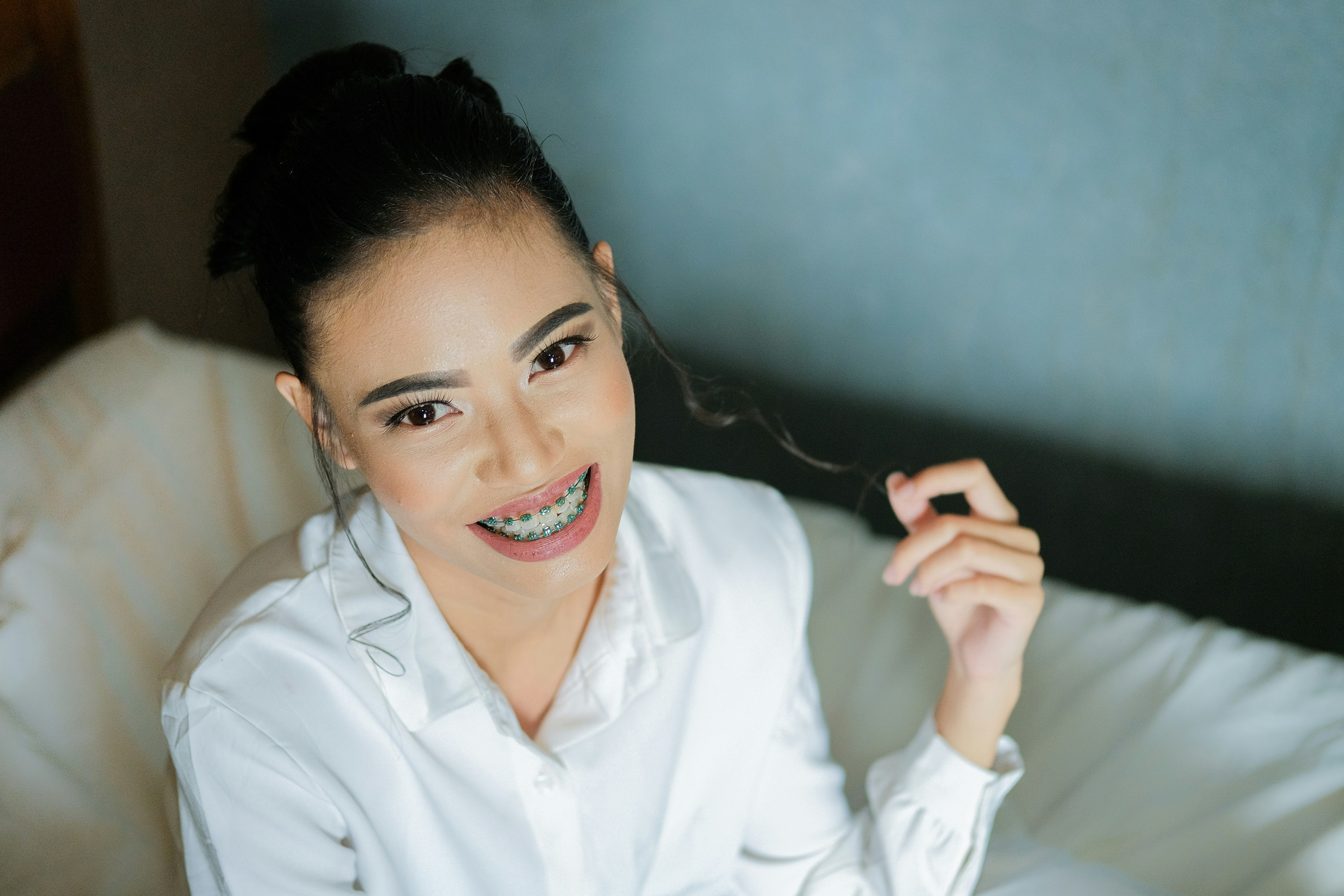 Person smiling with a bright white smile
