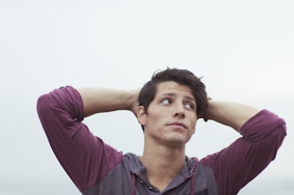 man holding his head