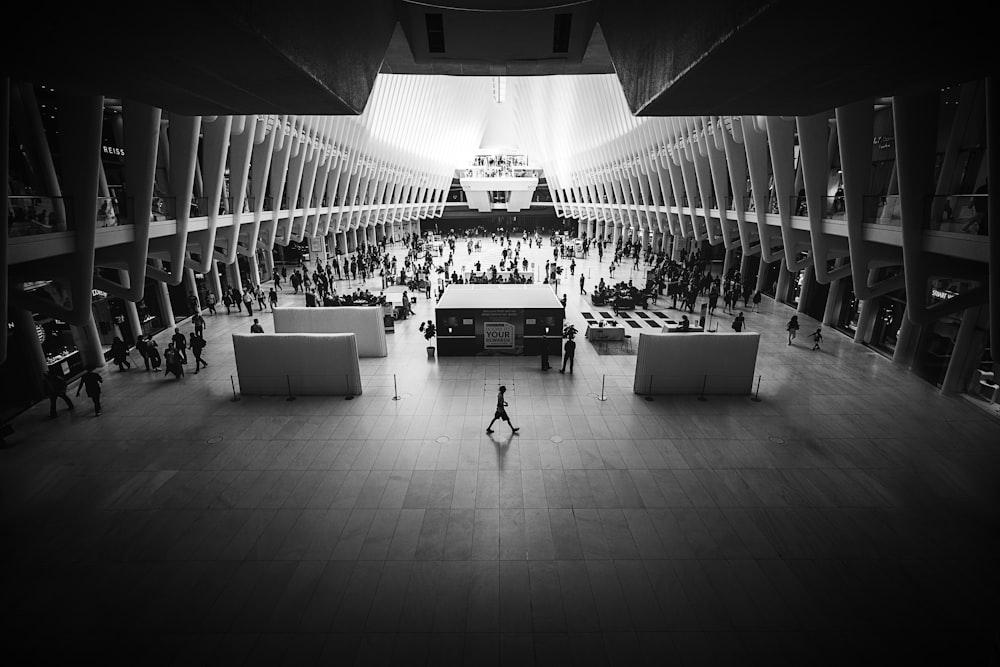 grayscale photo of people indoor