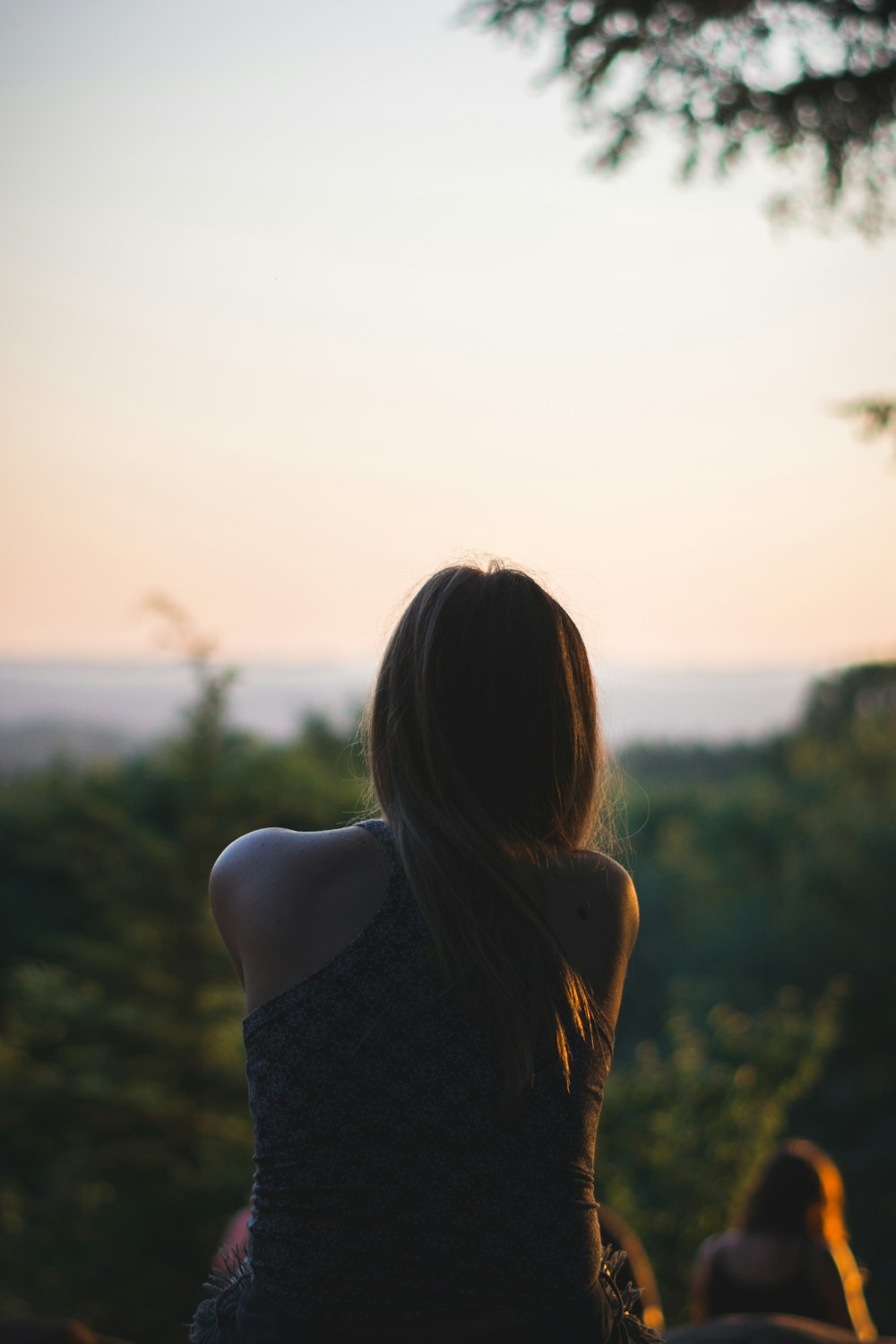 woman looking at forest