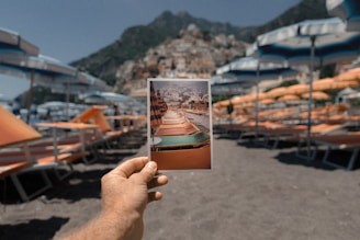 person holding outdoor lounge chairs photo