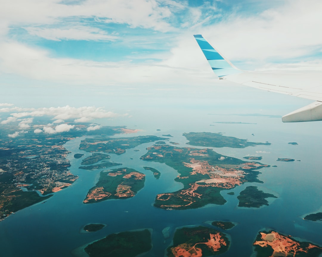aerial photography of islands from airplane, The view after take off from tanjung pinang