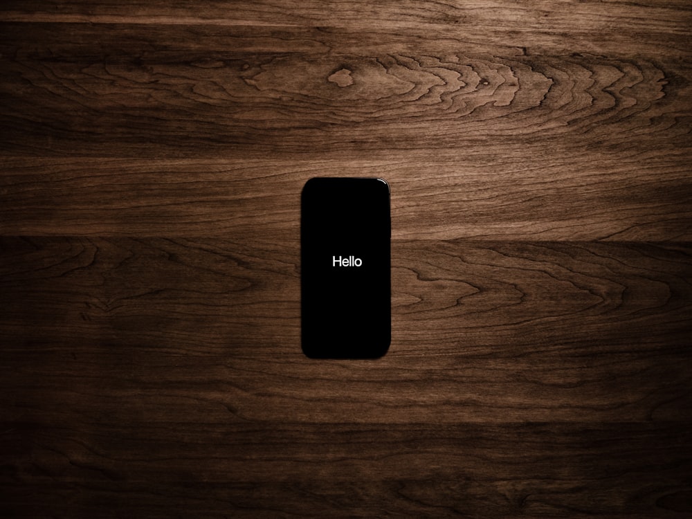 iPhone on wooden surface