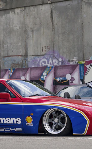red and blue Rothmas coupe parking