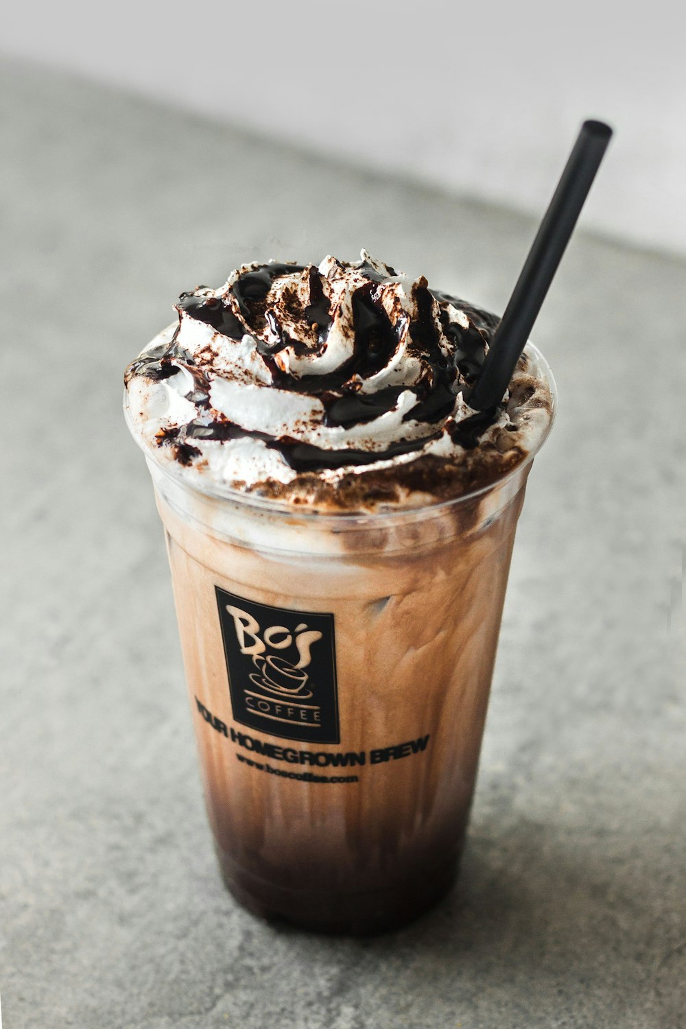 ice coffee cup on gray surface