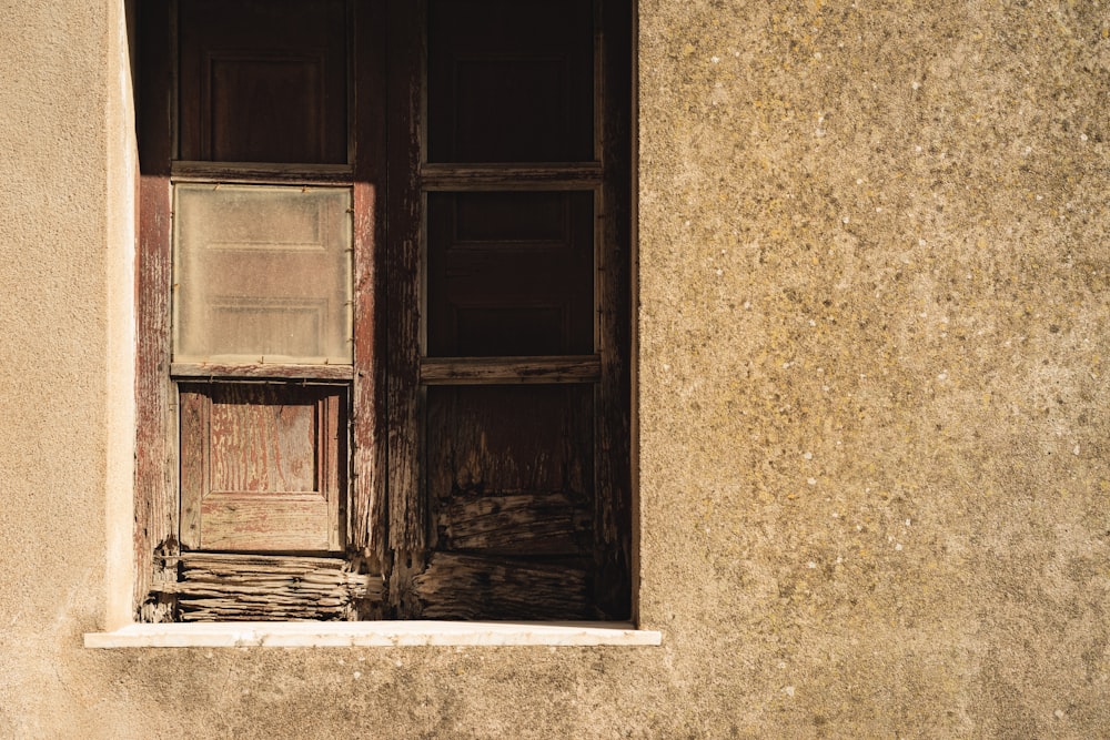 closed brown wooden window