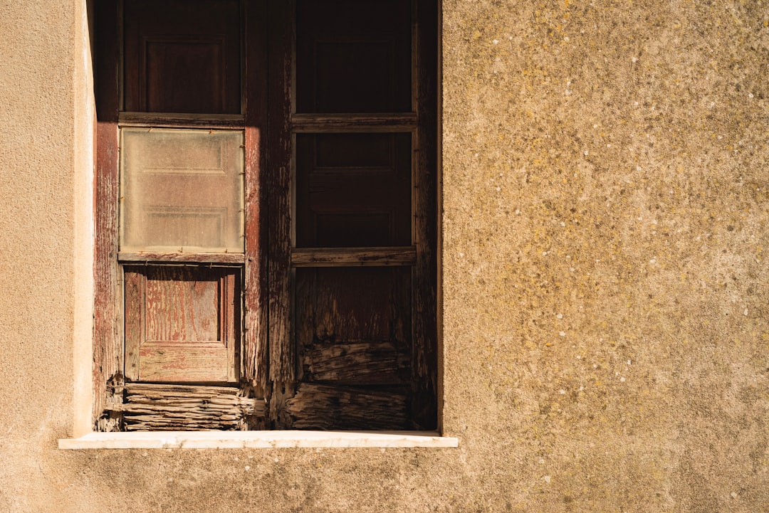 closed brown wooden window