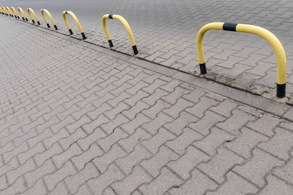 yellow and black metal fence