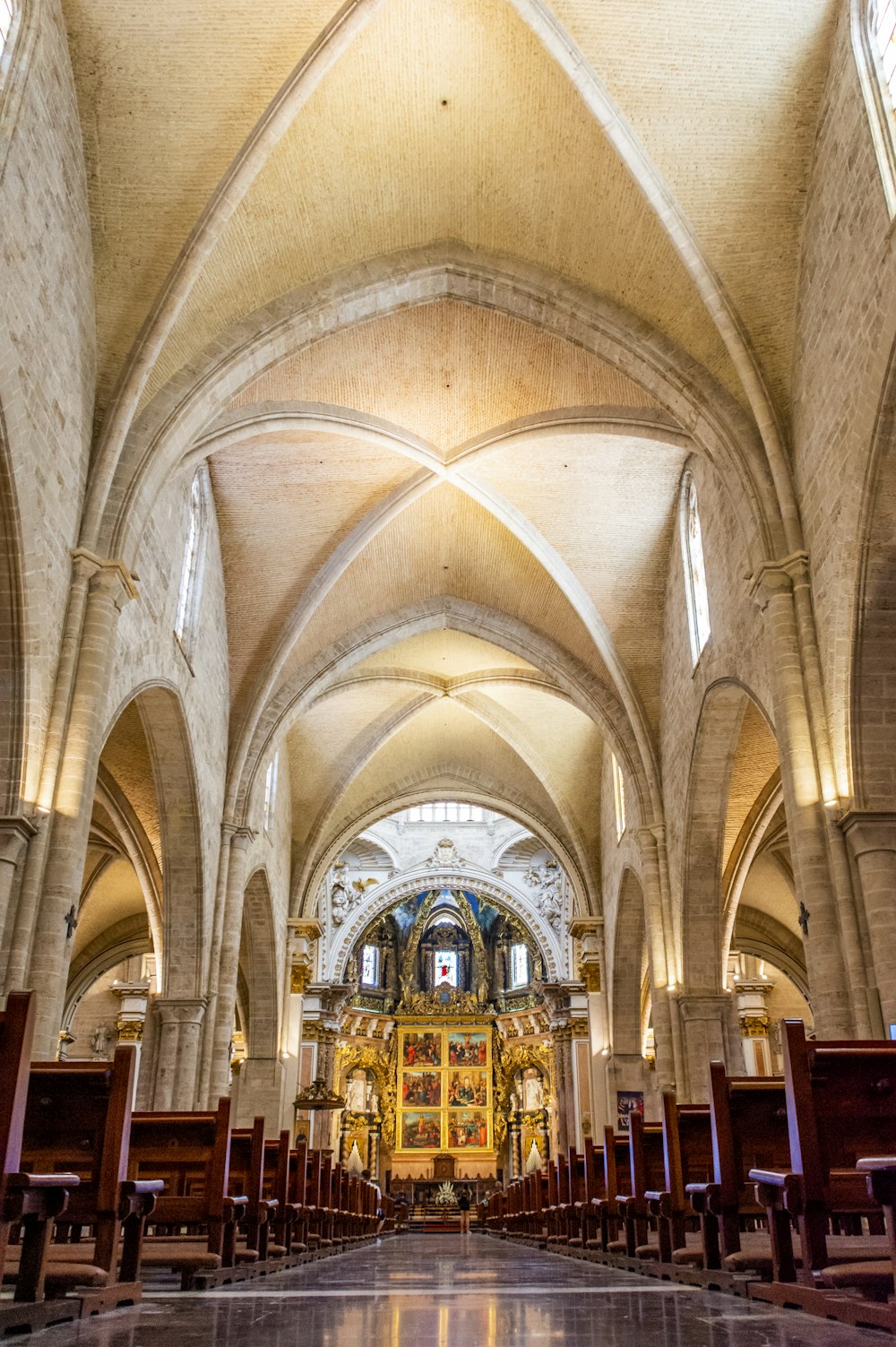 person showing church hallway to altar