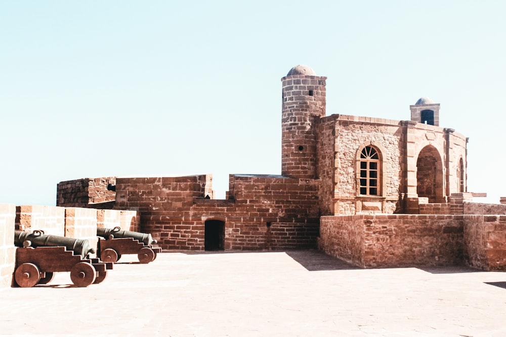 brown concrete tower with canons