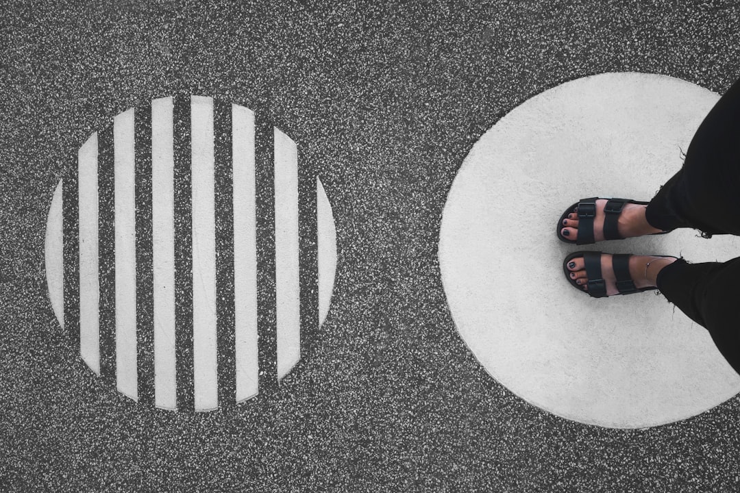 person standing on round concrete pavement, From where i stand