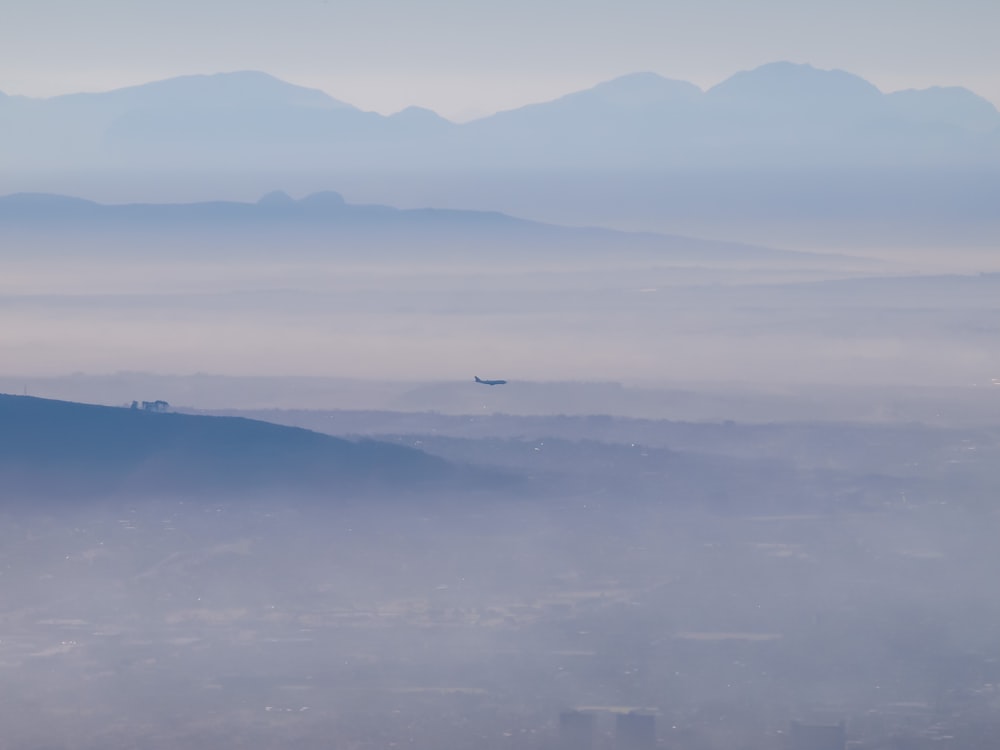 aerial view of city building covered with fog