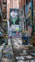 graffiti wall alley during daytime