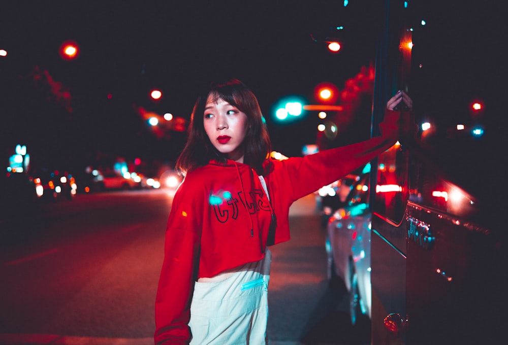 woman standing at the sidewalk