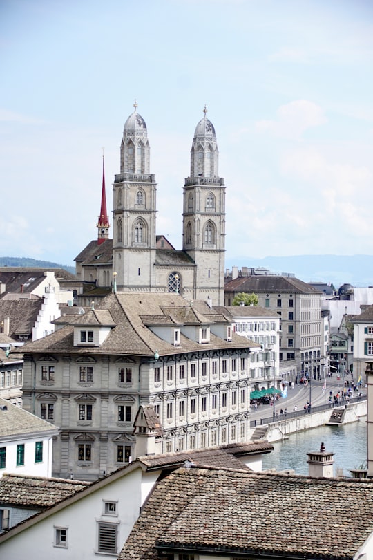 people walking near brown and white building in Zürich Switzerland