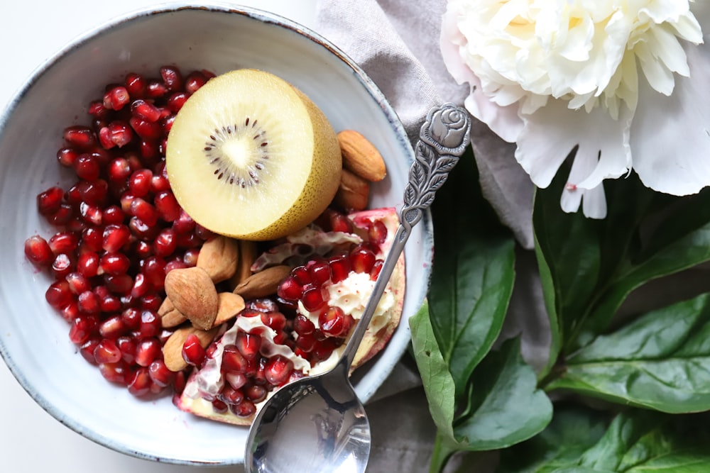 kiwi and peanuts on bowl