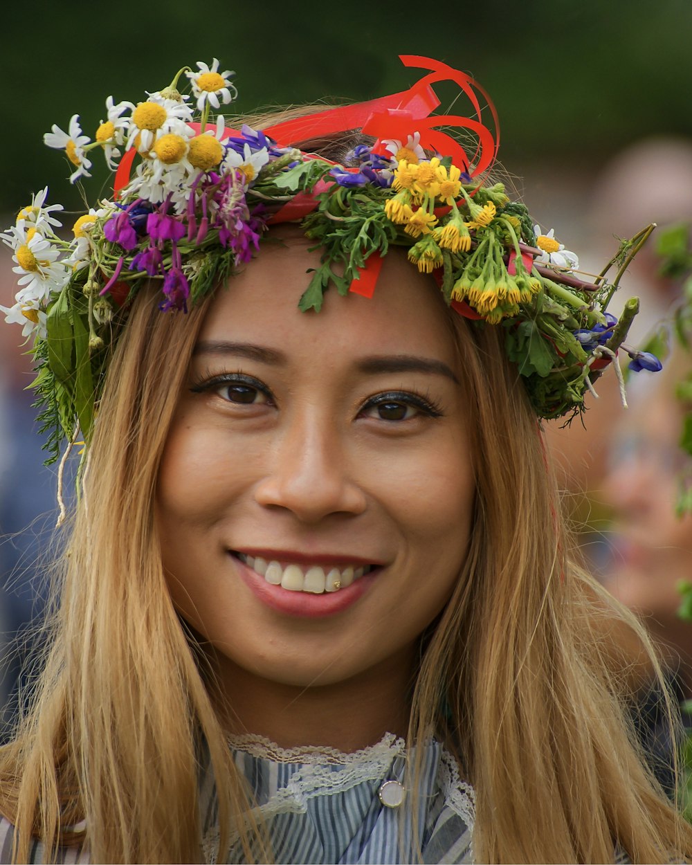 woman wearing yellow and green floral headdress