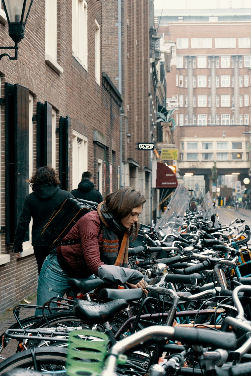 woman unlocking bicycle