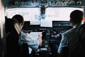 two men inside the plane