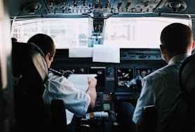 two men inside the plane