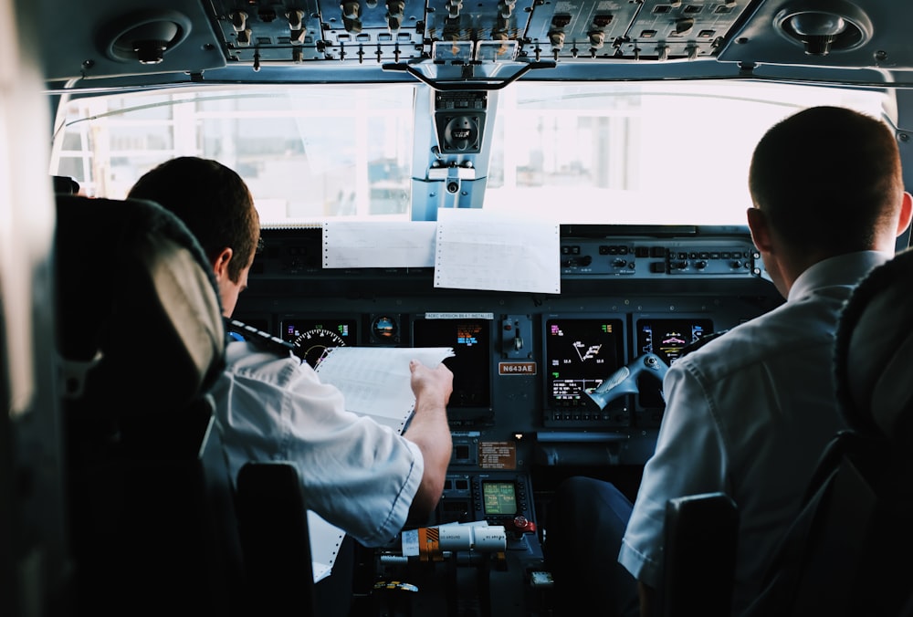 two men inside the plane