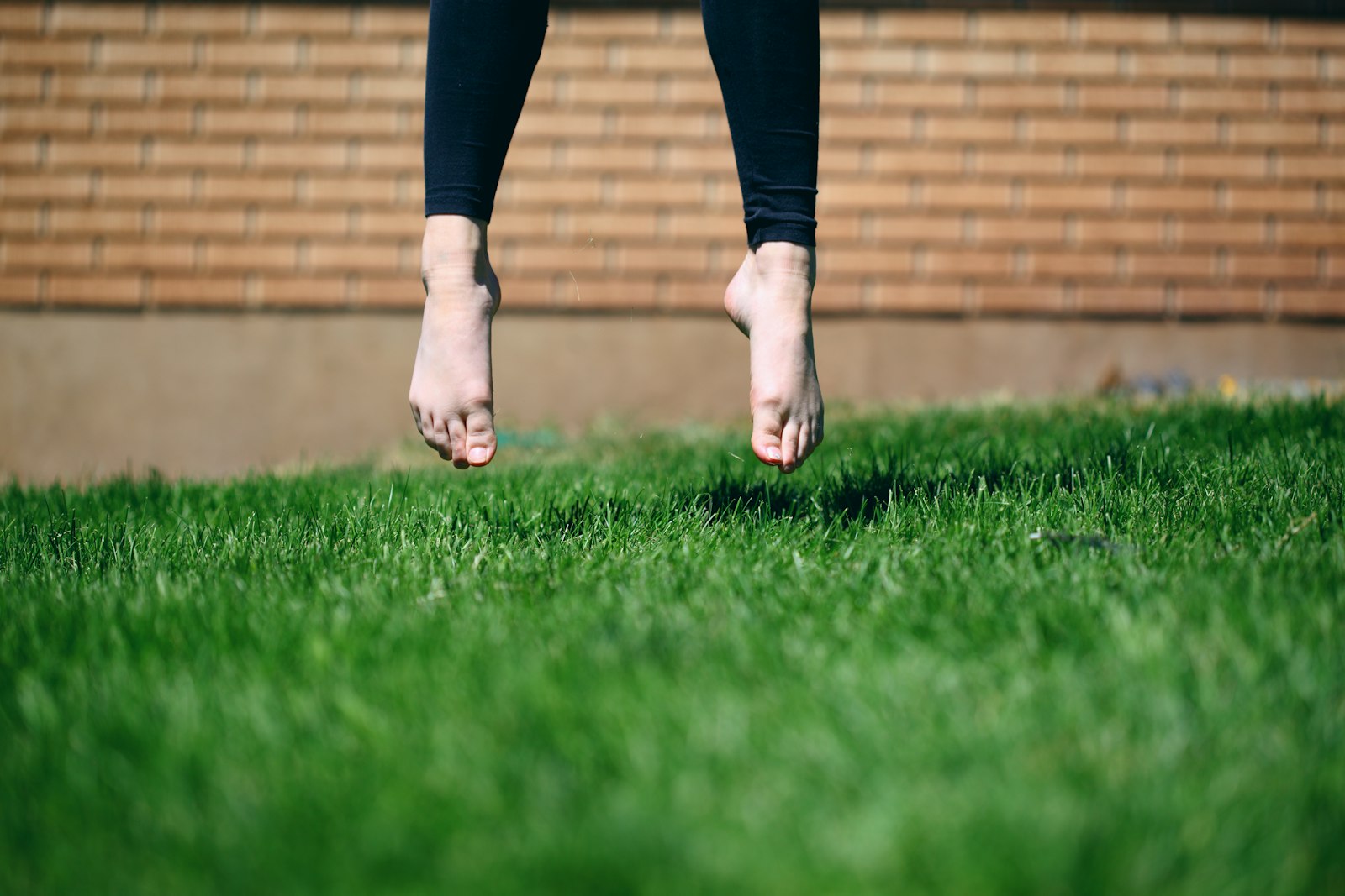 Canon EOS 5D Mark II + Canon EF 100mm F2.8 Macro USM sample photo. Person jumping on grass photography
