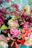 A vibrant floral arrangement for Mother's Day with soft pink and white flowers.