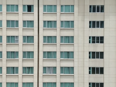 white concrete high rise building