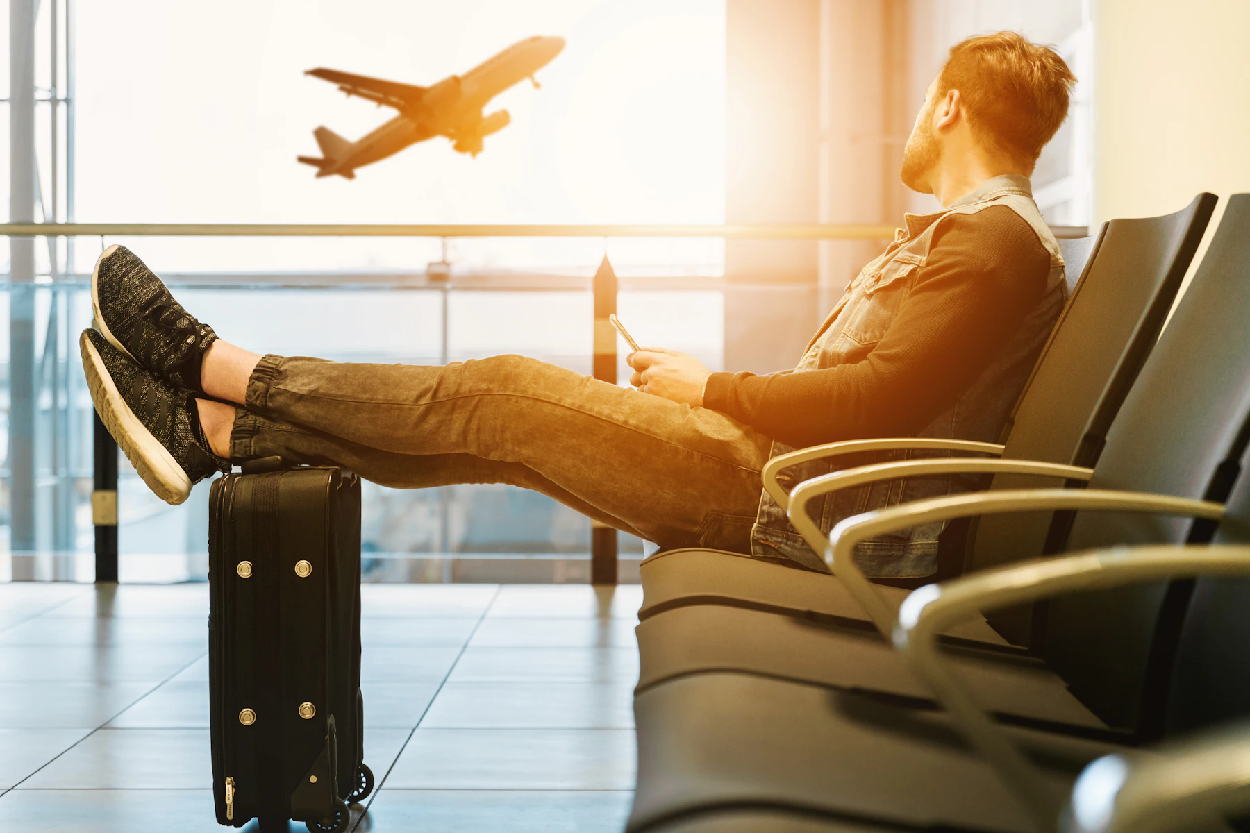 Travel documents and luggage prepared for a journey