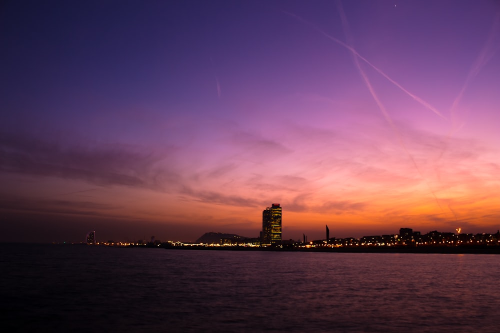 cityscape near body of water