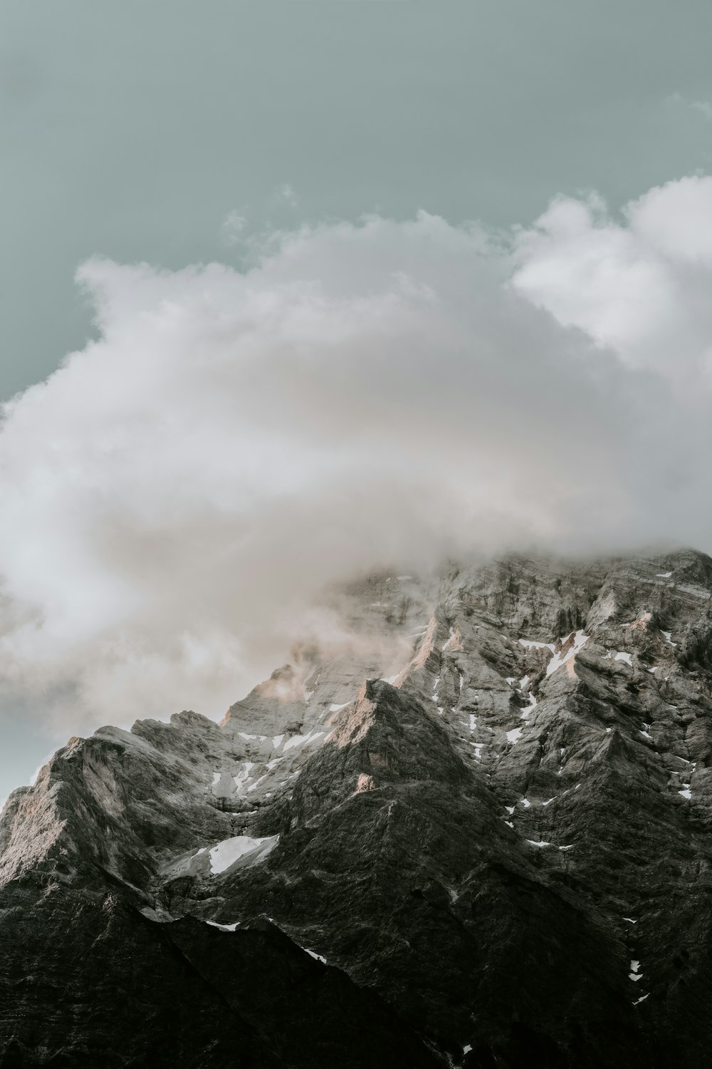 clouds covering mountains