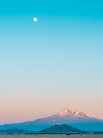 brown mountain under moon
