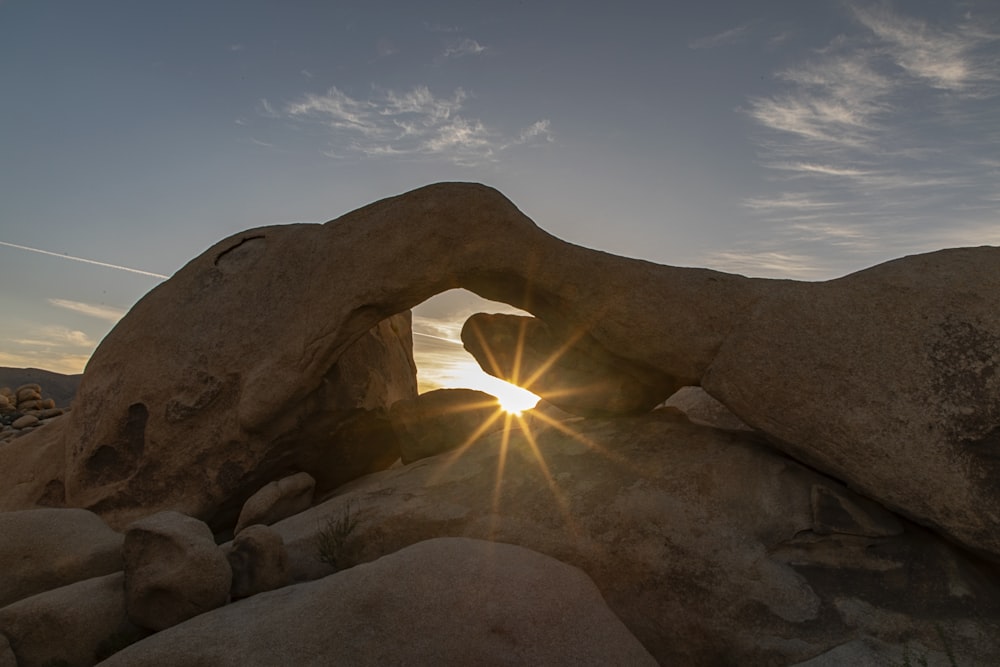 photo of rocks under blue sky during daytime