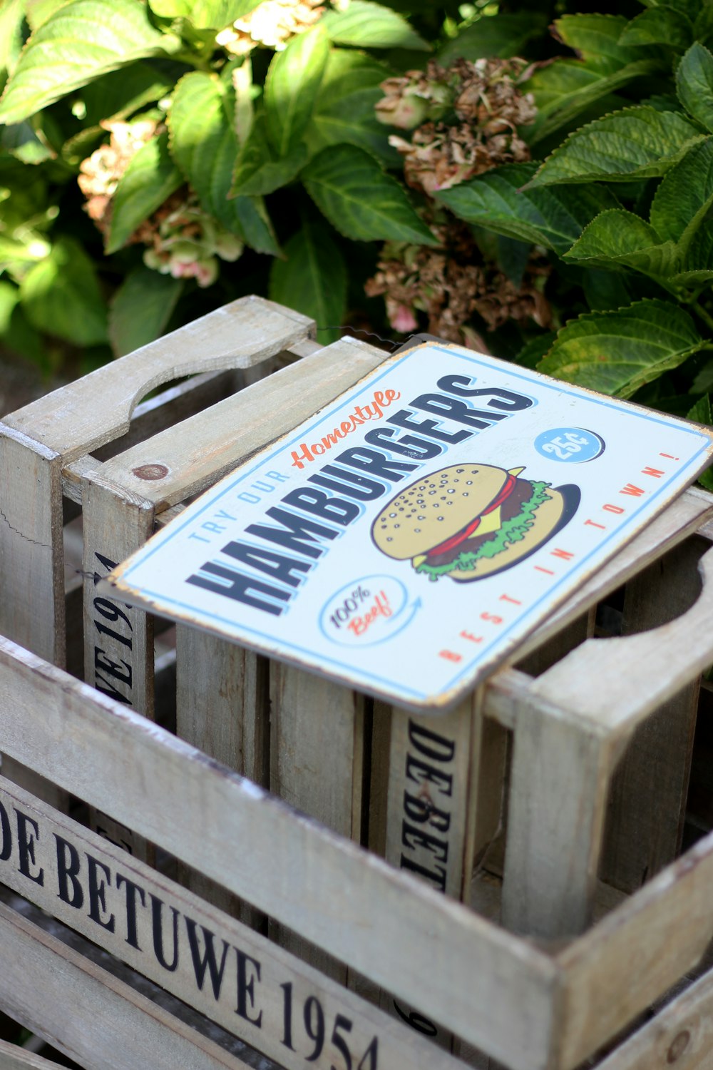 white and brown Hamburgers signboard