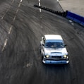 white car on gray asphalt road