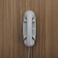 gray home phone on wall