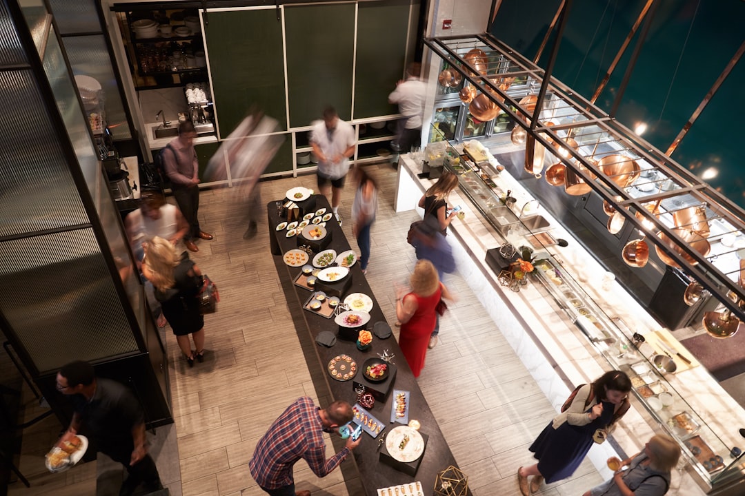people inside store standing and sitting,