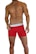 A muscular male torso is displayed, wearing bright red boxer briefs with a white waistband. The waistline of the briefs has a brand logo visible on it. The skin tone is tanned and the individual is posed in a confident stance.